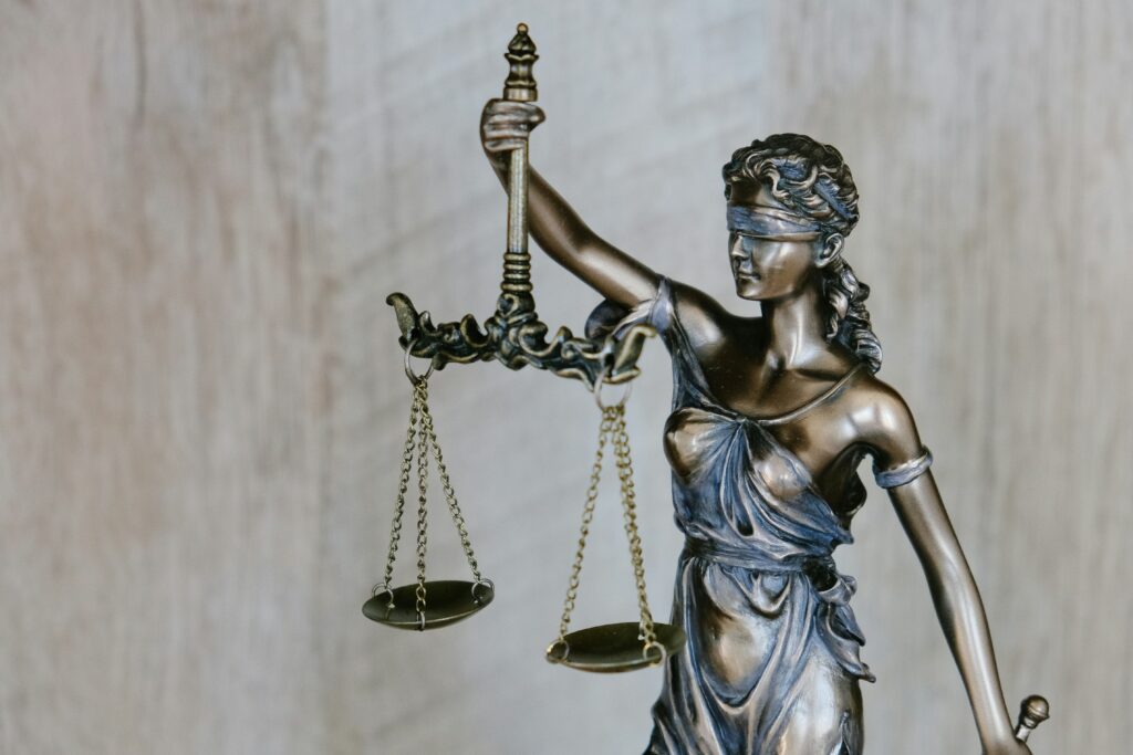 Statue of Lady Justice holding scales, symbolizing fairness and the rule of law